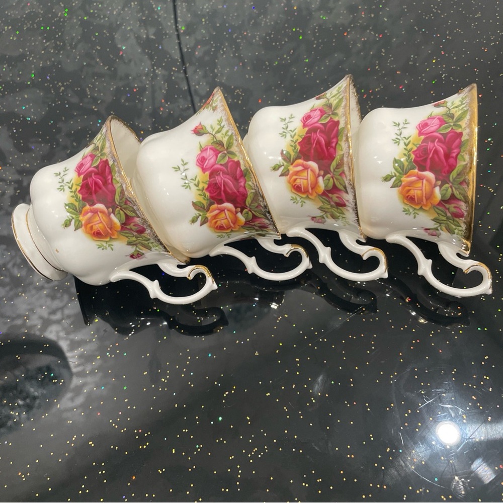 4 Royal Albert old country rose pattern charming tea/ coffee cups. Like new.